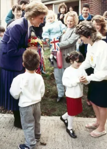 Leanne Venison finds it a little to much to present a posy to Princess Diana during her Leanne Venison finds it a little to much to present a posy to Princess Diana during her