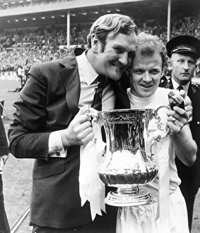 Leeds manager Don Revie with captain Billy Bremner hold the FA Cup trophy following their Leeds manager Don Revie with captain Billy Bremner hold the FA Cup trophy following their