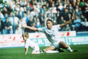 Leeds United footballer Vinnie Jones appeals after tackling the match mascot Leeds United footballer Vinnie Jones appeals after tackling the match mascot