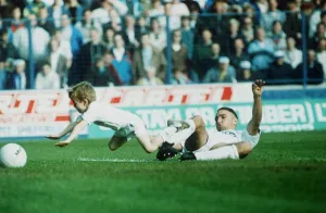 Leeds United footballer Vinnie Jones tackling the match mascot. 23rd October 1989 Leeds United footballer Vinnie Jones tackling the match mascot. 23rd October 1989