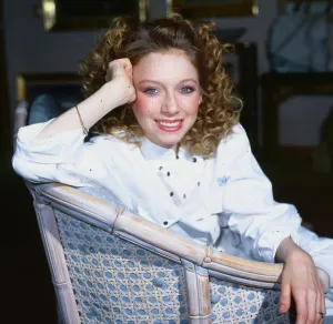Lena Zavaroni sitting in whicker chair, wearing a white jump suit, aged 22. December 1985 Lena Zavaroni sitting in whicker chair, wearing a white jump suit, aged 22. December 1985