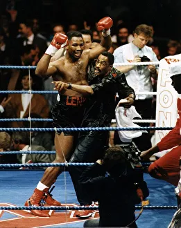 Lennox lewis Boxer celebrates his win over Derek Williams Lennox lewis Boxer celebrates his win over Derek Williams