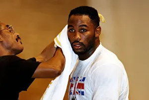 Lennox Lewis Boxing Heavyweight Boxer takes a break during a training session for his Lennox Lewis Boxing Heavyweight Boxer takes a break during a training session for his
