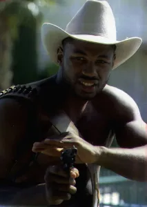 Lennox Lewis Boxing posing as a Cowboy in a press conference ahead of h WBC Heavyweight Lennox Lewis Boxing posing as a Cowboy in a press conference ahead of h WBC Heavyweight
