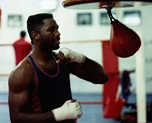 Lennox Lewis Boxing trains in the gym by hitting the speed ball Lennox Lewis Boxing trains in the gym by hitting the speed ball