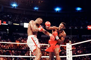 Lennox Lewis British Heavyweight champion in action to defeat challenger Tony Tucker in Lennox Lewis British Heavyweight champion in action to defeat challenger Tony Tucker in
