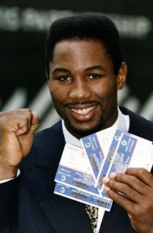 Lennox Lewis Heavyweight Boxer holding tickets to Razor Ruddock fight Lennox Lewis Heavyweight Boxer holding tickets to Razor Ruddock fight