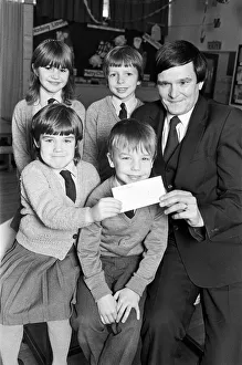 Lepton C of E Church school pupils present cheque for A¿127 to RNIB appeals organiser Lepton C of E Church school pupils present cheque for A¿127 to RNIB appeals organiser