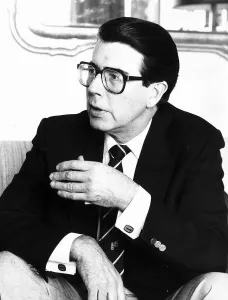 Leslie Crowther actor and TV presenter sitting down Leslie Crowther actor and TV presenter sitting down