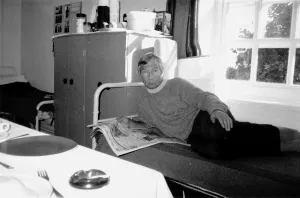 Lester Piggott jockey prison cell Highpoint Open prison lying on bed reading newspaper Lester Piggott jockey prison cell Highpoint Open prison lying on bed reading newspaper