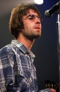 Liam Gallagher of pop group band Oasis on stage at Ingliston showground in Edinburgh Liam Gallagher of pop group band Oasis on stage at Ingliston showground in Edinburgh