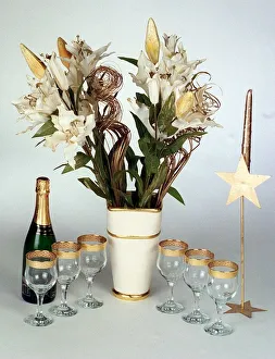 Life Style October 1998 White vase with lilies bottle of champagne glasses Life Style October 1998 White vase with lilies bottle of champagne glasses