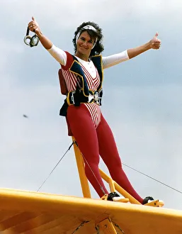 Linda Lusardi Model/TV Presenter standing on top of a plane May 1990 Linda Lusardi Model/TV Presenter standing on top of a plane May 1990