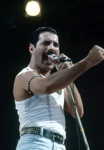 Live Aid concert at Wembley Stadium. Queen lead singer Freddie Mercury on stage Live Aid concert at Wembley Stadium. Queen lead singer Freddie Mercury on stage