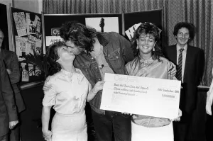 Live Aid fundraising star Bob Geldof was presented with a giant National Girobank cheque Live Aid fundraising star Bob Geldof was presented with a giant National Girobank cheque