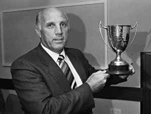 Liverpool coach Ronnie Moran holds the Dixie Dean Memorial trophy after nearly forty Liverpool coach Ronnie Moran holds the Dixie Dean Memorial trophy after nearly forty
