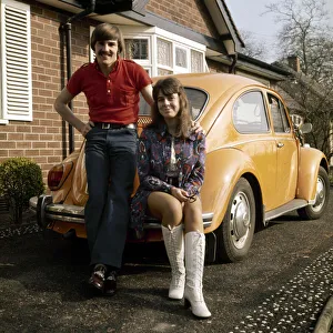 Liverpool footballer Steve Heighway and his wife Sue stand beside their Volkswagen Beetle Liverpool footballer Steve Heighway and his wife Sue stand beside their Volkswagen Beetle