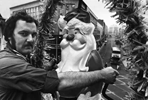 Liverpool lighting engineer Frank Fox seen here installing the first of many of Liverpool lighting engineer Frank Fox seen here installing the first of many of
