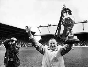 Liverpool manager Bob Paisley celebrates with the League Championship trophy at Anfield Liverpool manager Bob Paisley celebrates with the League Championship trophy at Anfield