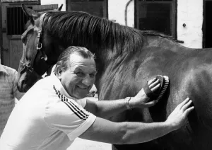 Liverpool manager Bob Paisley pictured at the stables of his close friend Frank Carr in Liverpool manager Bob Paisley pictured at the stables of his close friend Frank Carr in