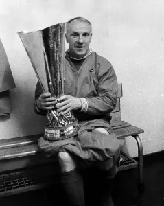 Liverpool manager Bill Shankly holding the UEFA Cup trophy after his side defeated Liverpool manager Bill Shankly holding the UEFA Cup trophy after his side defeated
