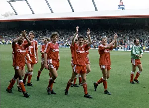 Liverpool players acknowledge their fans and celebrate winning the League Championship at Liverpool players acknowledge their fans and celebrate winning the League Championship at
