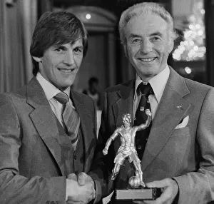Liverpool star Kenny Dalglish recieves the Footballer of the year award from Stanley Liverpool star Kenny Dalglish recieves the Footballer of the year award from Stanley
