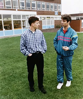Images Dated 14th November 1994: Liverpool striker Robbie Fowler meets up with old PE teacher Max Warren at Nugent RC High