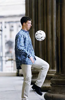 Liverpool striker Robbie Fowler showing off his ball skills at St George's Hall Liverpool striker Robbie Fowler showing off his ball skills at St George's Hall