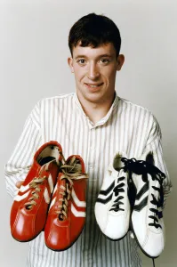 Liverpool teenage sensation Robbie Fowler with 2 pairs of football boots Liverpool teenage sensation Robbie Fowler with 2 pairs of football boots