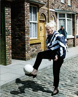 Liz Dawn Actress who plays the part of Vera Duckworth in Coronation Street kicks football Liz Dawn Actress who plays the part of Vera Duckworth in Coronation Street kicks football