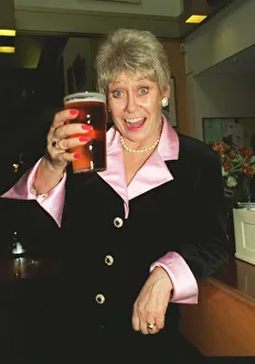 Liz Dawn Vera Duckworth of Coronation Street raises a glass to celebrate her taking over Liz Dawn Vera Duckworth of Coronation Street raises a glass to celebrate her taking over