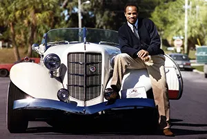LLoyd Honeyghan Boxing Sitting on front of car LLoyd Honeyghan Boxing Sitting on front of car