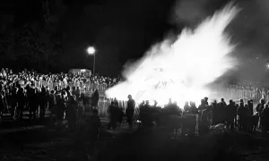 Local residents gather around the bonfire at Clairville Common Local residents gather around the bonfire at Clairville Common