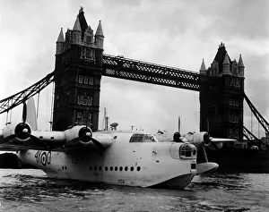 London Views Thames River September 1950 - RAF Suderland flying-boat moored next to Tower London Views Thames River September 1950 - RAF Suderland flying-boat moored next to Tower