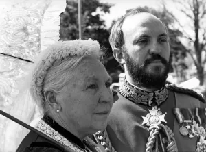 Looking for all the world like the real Queen Victoria and her consort are Alice Looking for all the world like the real Queen Victoria and her consort are Alice