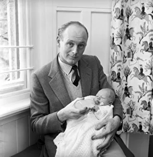 Lord Montagu of Beaulieu with his newborn son Ralph Montagu giving him his first feed at Lord Montagu of Beaulieu with his newborn son Ralph Montagu giving him his first feed at