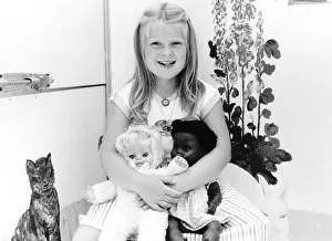 Louise Brown Test tube Girl holding dolls on her sith birthday July 1984 Louise Brown Test tube Girl holding dolls on her sith birthday July 1984