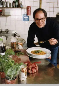 Loyd Grossman TV Presenter of Master Chef in his wn kitchen trying out his own cooking Loyd Grossman TV Presenter of Master Chef in his wn kitchen trying out his own cooking