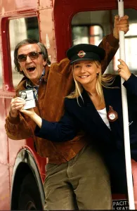 Lynn Parsons Radio One disc jockey with colleague Alan Freeman holding a bus pass DBase Lynn Parsons Radio One disc jockey with colleague Alan Freeman holding a bus pass DBase