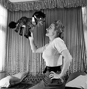 Lynne Breton. Woman with stuffed toy donkey. October 1952 C4870-002 Lynne Breton. Woman with stuffed toy donkey. October 1952 C4870-002