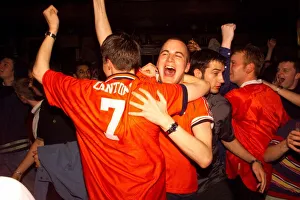 Machester United fans celebrate the 2-3 win April 1999 in O'Shea' Machester United fans celebrate the 2-3 win April 1999 in O'Shea'