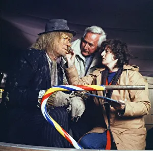 A make-up artist touches up Jon Pertwee make-up on the set of Southern Television A make-up artist touches up Jon Pertwee make-up on the set of Southern Television
