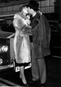 Malcolm Allison football manager seen here at Heathrow airport with partner Malcolm Allison football manager seen here at Heathrow airport with partner
