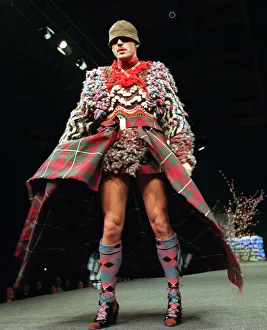 male tartan model on catwalk at westwood show male tartan model on catwalk at westwood show