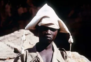 Mali Dagon Tribe a adolescent from the tribe wearing a traditional hat Mali Dagon Tribe a adolescent from the tribe wearing a traditional hat