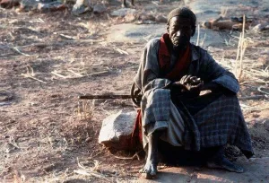 Mali Dagon Tribe Houlou Barou Holy Man at dawn waits reading of sacred tabloid Mali Dagon Tribe Houlou Barou Holy Man at dawn waits reading of sacred tabloid