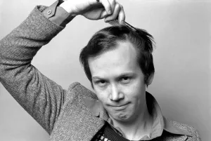 Man combing his hair. July 1975 75-00177-003 Man combing his hair. July 1975 75-00177-003