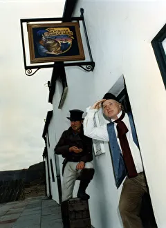 A man in costume poses outside Saltburn Smugglers Heritage Centre. 6th December 1991 A man in costume poses outside Saltburn Smugglers Heritage Centre. 6th December 1991