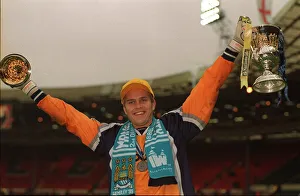 Manchester City keeper Nick Weaver celebrates May 1999 with trophy folowing Manchester City keeper Nick Weaver celebrates May 1999 with trophy folowing